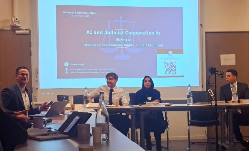 Conference presentation slide titled AI and Judicial Cooperation in Serbia at Université Grenoble Alpes.