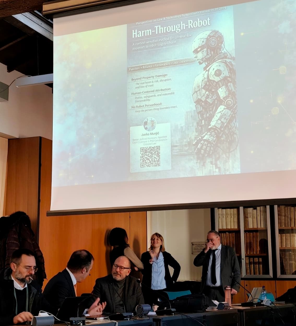 Conference slide titled Harm-Through-Robot during a law and technology symposium in Verona.